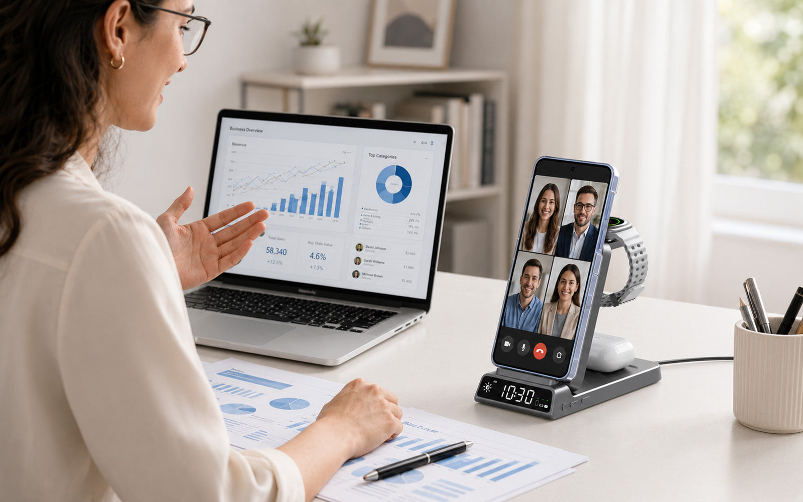 Elecdov 3-in-1 Qi2 charging station on a professional home-office desk during a video call